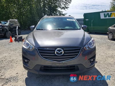 Piąte zdjęcie samochodu w środku: 2016 MAZDA CX-5 GT VIN:JM3KE4DY6G0900033 - miniatura
