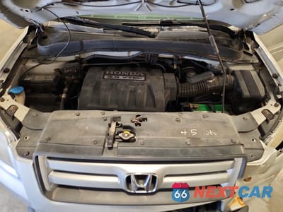 Zdjęcie 12 z 13 samochodu: 2007 HONDA PILOT EXL VIN:2HKYF18627H507401 - miniatura