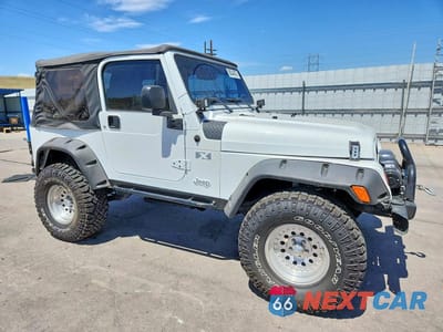 Czwarte zdjęcie samochodu z boku: 2004 JEEP WRANGLER X VIN:1J4FA39S94P700586 - miniatura