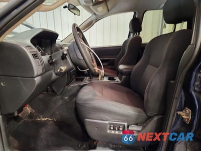 Zdjęcie 7 z 14 samochodu: 2004 JEEP GRAND CHEROKEE LAREDO VIN:1J4GW48S04C109874 - miniatura