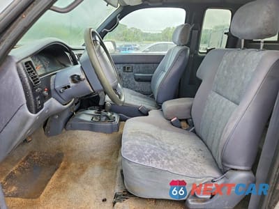 Zdjęcie 7 z 12 samochodu: 2000 TOYOTA TACOMA XTRACAB VIN:4TAWM72N6YZ597691 - miniatura