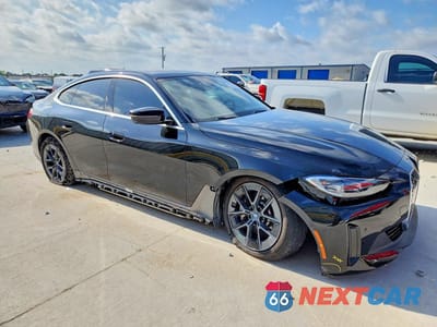 Czwarte zdjęcie samochodu z boku: 2023 BMW I4 EDRIVE 35 VIN:WBY43AW08PFR44530 - miniatura