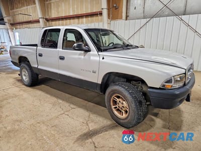 Czwarte zdjęcie samochodu z boku: 2002 DODGE DAKOTA QUAD SLT VIN:1B7HG48N02S581528 - miniatura