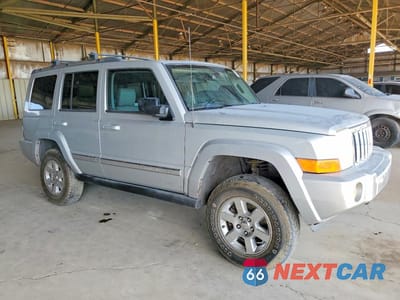 Czwarte zdjęcie samochodu z boku: 2007 JEEP COMMANDER LIMITED VIN:1J8HG58287C587177 - miniatura