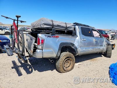 Trzecie zdjęcie samochodu z tyłu: 2022 TOYOTA TACOMA TRD OFF-ROAD VIN:3TMCZ5AN3NM496927 - miniatura