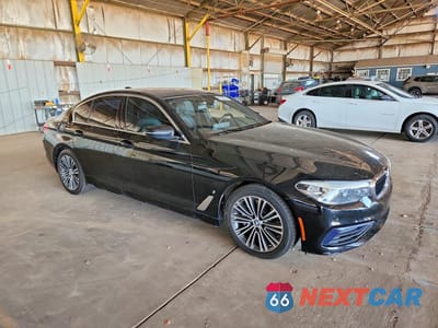 Czwarte zdjęcie samochodu z boku: 2019 BMW 530E VIN:WBAJA9C53KB392649 - miniatura