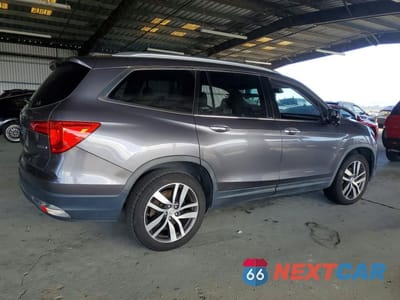 Trzecie zdjęcie samochodu z tyłu: 2016 HONDA PILOT TOURING VIN:5FNYF5H94GB016036 - miniatura