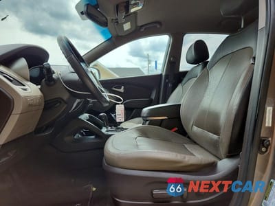 Zdjęcie 7 z 13 samochodu: 2013 HYUNDAI TUCSON LIMITED VIN:KM8JUCAC3DU621147 - miniatura