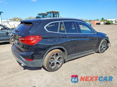 Trzecie zdjęcie samochodu z tyłu: 2017 BMW X1 XDRIVE28I VIN:WBXHT3C37H5F69319 - miniatura