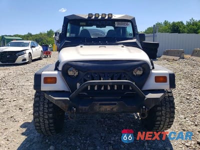 Piąte zdjęcie samochodu w środku: 1998 JEEP WRANGLER VIN:1J4FY29P5WP765620 - miniatura