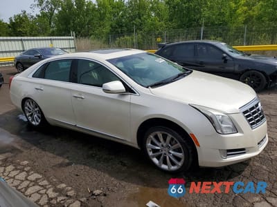 Czwarte zdjęcie samochodu z boku: 2013 CADILLAC XTS LUXURY COLLECTION VIN:2G61P5S36D9115012 - miniatura