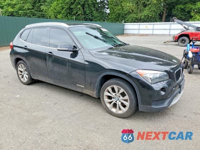 Czwarte zdjęcie samochodu z boku: 2013 BMW X1 XDRIVE28I VIN:WBAVL1C50DVR91832 - miniatura