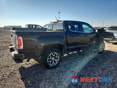 Trzecie zdjęcie samochodu z tyłu: 2016 GMC CANYON SLE VIN:1GTG6CE33G1276856 - miniatura