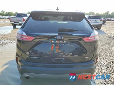 Zdjęcie 6 z 13 samochodu: 2022 FORD EDGE TITANIUM VIN:2FMPK4K9XNBA16266 - miniatura
