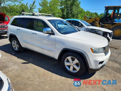 Czwarte zdjęcie samochodu z boku: 2011 JEEP GRAND CHEROKEE OVERLAND VIN:1J4RR6GT7BC684668 - miniatura
