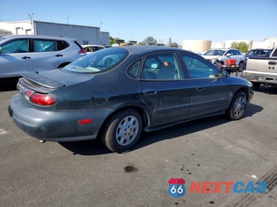 Trzecie zdjęcie samochodu z tyłu: 1998 FORD TAURUS LX VIN:1FAFP52SXWG161611 - miniatura