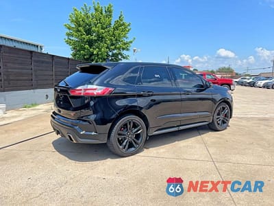 Czwarte zdjęcie samochodu z boku: 2019 FORD EDGE ST VIN:2FMPK4AP2KBB95737 - miniatura