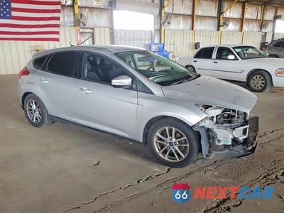 Czwarte zdjęcie samochodu z boku: 2016 FORD FOCUS SE VIN:1FADP3K21GL283259 - miniatura