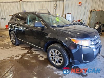 Czwarte zdjęcie samochodu z boku: 2011 FORD EDGE VIN:2FMDK3JC6BBA02709 - miniatura