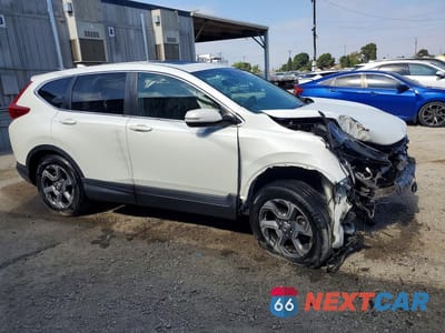 Czwarte zdjęcie samochodu z boku: 2018 HONDA CR-V EX VIN:2HKRW1H56JH511051 - miniatura