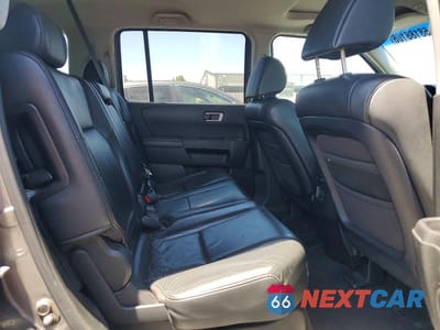 Zdjęcie 11 z 13 samochodu: 2009 HONDA PILOT EXL VIN:5FNYF38529B002611 - miniatura