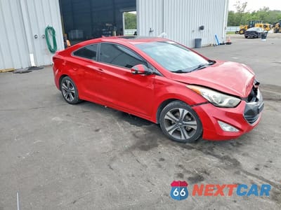 Czwarte zdjęcie samochodu z boku: 2013 HYUNDAI ELANTRA COUPE SE VIN:KMHDH6AE6DU006399 - miniatura