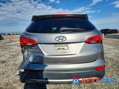 Zdjęcie 6 z 13 samochodu: 2013 HYUNDAI SANTA FE SPORT 2.4L VIN:5XYZTDLBXDG080622 - miniatura
