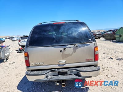 Zdjęcie 6 z 13 samochodu: 2002 GMC YUKON VIN:1GKEK13ZX2R213153 - miniatura