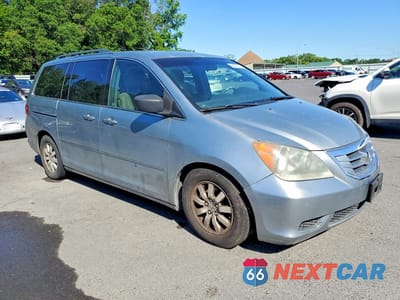 Czwarte zdjęcie samochodu z boku: 2010 HONDA ODYSSEY EX VIN:5FNRL3H42AB077690 - miniatura