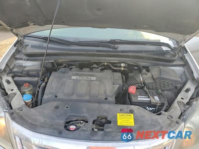 Zdjęcie 12 z 13 samochodu: 2009 HONDA ODYSSEY EXL VIN:5FNRL38659B032367 - miniatura