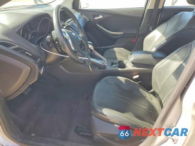 Zdjęcie 7 z 12 samochodu: 2012 FORD FOCUS SEL VIN:1FAHP3H21CL454255 - miniatura