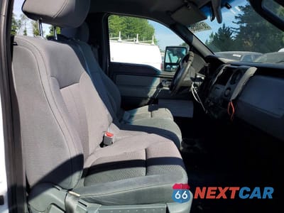 Zdjęcie 10 z 12 samochodu: 2014 FORD F150 VIN:1FTMF1CM0EKF55966 - miniatura