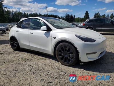 Czwarte zdjęcie samochodu z boku: 2025 TESLA MODEL Y VIN:7SAYGAEE7SF302773 - miniatura