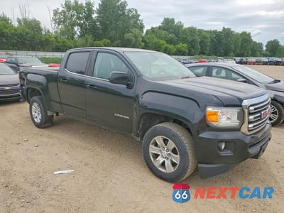 Czwarte zdjęcie samochodu z boku: 2018 GMC CANYON SLE VIN:1GTG6CEN5J1100786 - miniatura