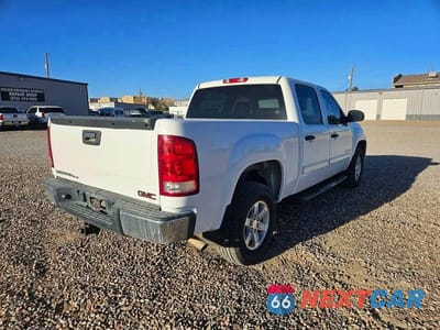 Czwarte zdjęcie samochodu z boku: 2007 GMC NEW SIERRA C1500 VIN:3GTEC13J27G537420 - miniatura