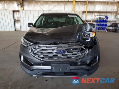 Piąte zdjęcie samochodu w środku: 2019 FORD EDGE TITANIUM VIN:2FMPK4K90KBC02023 - miniatura