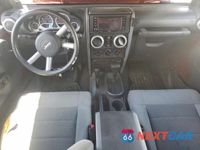 Zdjęcie 8 z 13 samochodu: 2008 JEEP WRANGLER UNLIMITED SAHARA VIN:1J4GA59178L651005 - miniatura