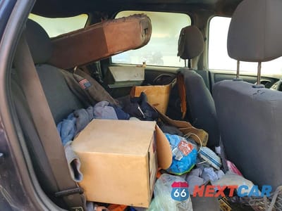 Zdjęcie 11 z 13 samochodu: 2004 MAZDA TRIBUTE DX VIN:4F2YZ02B34KM03925 - miniatura