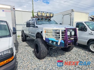 Czwarte zdjęcie samochodu z boku: 2011 FORD F350 SUPER DUTY VIN:1FT8W3BT8BED02054 - miniatura