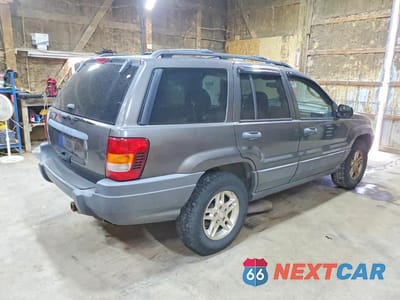 Trzecie zdjęcie samochodu z tyłu: 2004 JEEP GRAND CHEROKEE LAREDO VIN:1J4GX48S54C427972 - miniatura