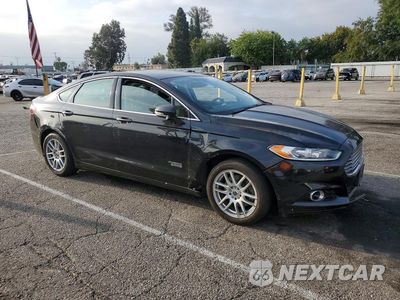 Czwarte zdjęcie samochodu z boku: 2014 FORD FUSION TITANIUM PHEV VIN:3FA6P0SU5ER366913 - miniatura