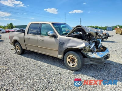Czwarte zdjęcie samochodu z boku: 2002 FORD F150 SUPERCREW VIN:1FTRW07682KE38675 - miniatura