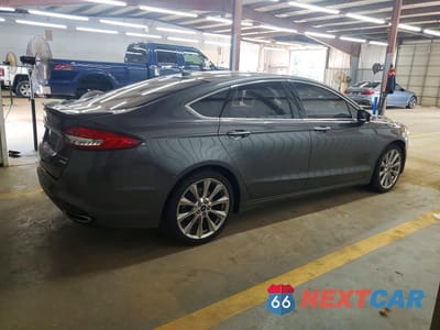 Trzecie zdjęcie samochodu z tyłu: 2017 FORD FUSION TITANIUM VIN:3FA6P0K96HR402012 - miniatura