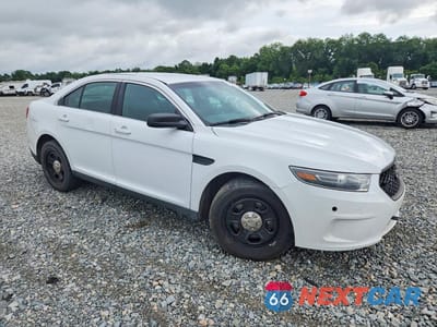 Czwarte zdjęcie samochodu z boku: 2016 FORD TAURUS POLICE INTERCEPTOR VIN:1FAHP2L88GG122446 - miniatura