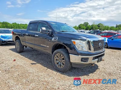 Czwarte zdjęcie samochodu z boku: 2017 NISSAN TITAN XD SV VIN:1N6BA1F35HN575249 - miniatura