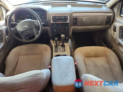 Zdjęcie 8 z 13 samochodu: 2004 JEEP GRAND CHEROKEE LAREDO VIN:1J4GW48S34C238675 - miniatura