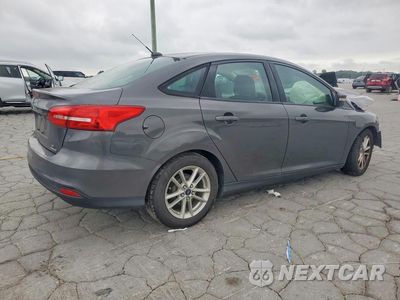 Trzecie zdjęcie samochodu z tyłu: 2016 FORD FOCUS SE VIN:1FADP3F26GL303385 - miniatura