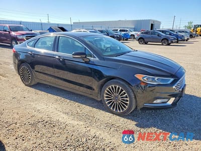 Czwarte zdjęcie samochodu z boku: 2017 FORD FUSION SE VIN:3FA6P0H9XHR284313 - miniatura