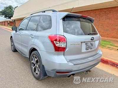 Trzecie zdjęcie samochodu z tyłu: 2014 SUBARU FORESTER 2.0XT TOURING VIN:JF2SJGPC9EH473176 - miniatura
