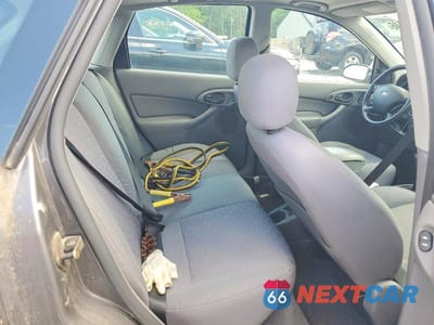 Zdjęcie 10 z 12 samochodu: 2004 FORD FOCUS ZX5 VIN:3FAFP37Z84R110902 - miniatura
